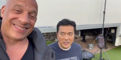 vin diesel and justin lin outside movie trailer