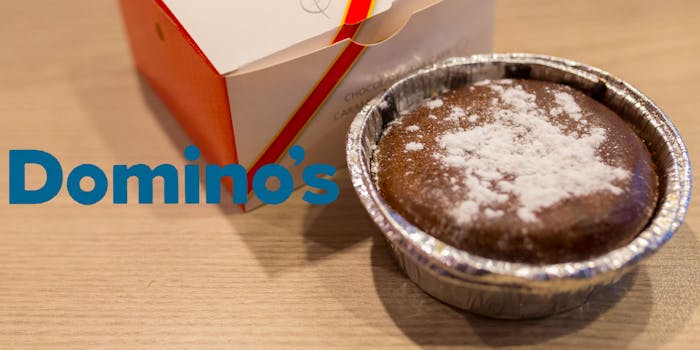 Domino's logo with lava cake on table with box