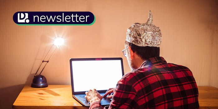 A person wearing a tin foil hat typing on a laptop. In the top left corner is the Daily Dot newsletter logo.