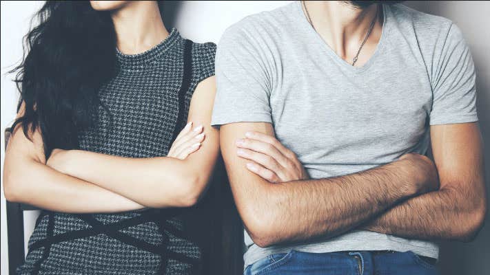 Two people with their arms folded. This is an ad for the Daily Dot newsletter.