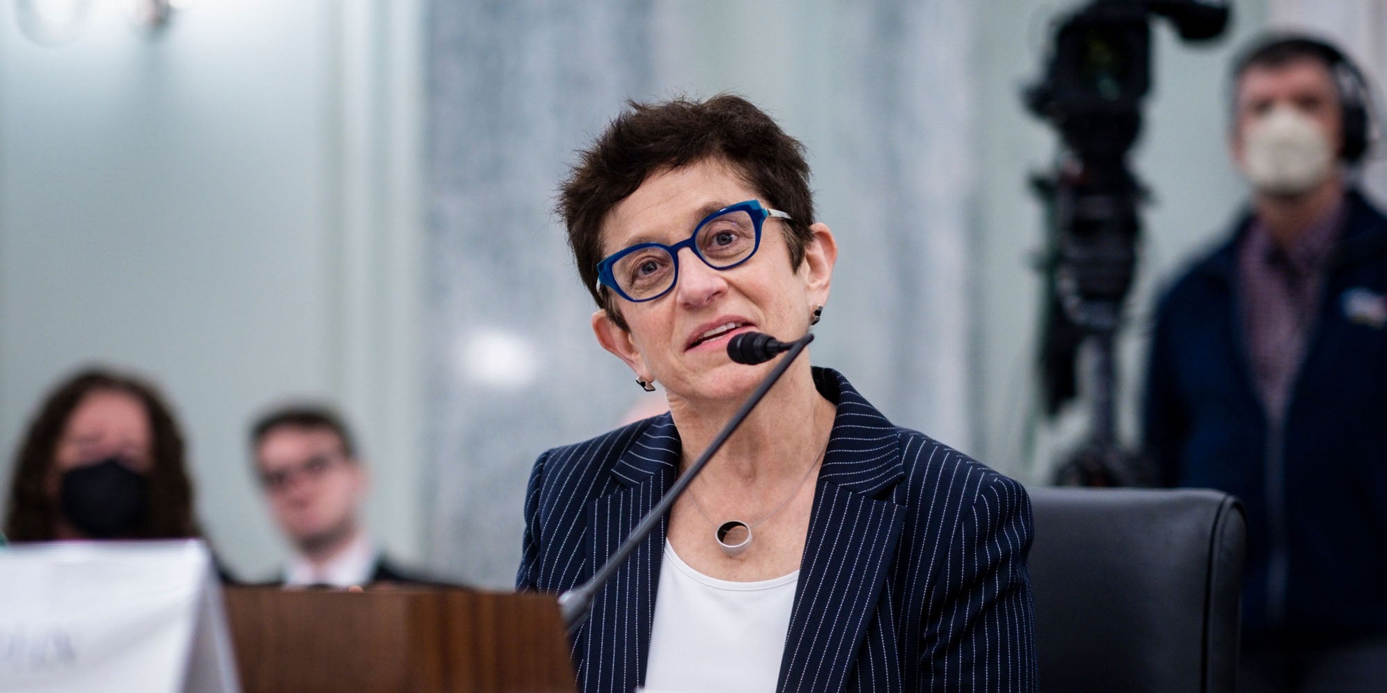 Gigi Sohn speaking into microphone