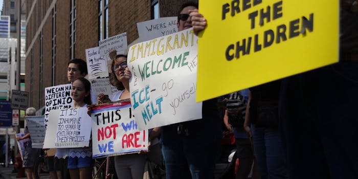 protesters with signs about ICE "Free the children" "Immigrants welcome, ICE- go melt yourself" It is inhumane to separate children from their families"