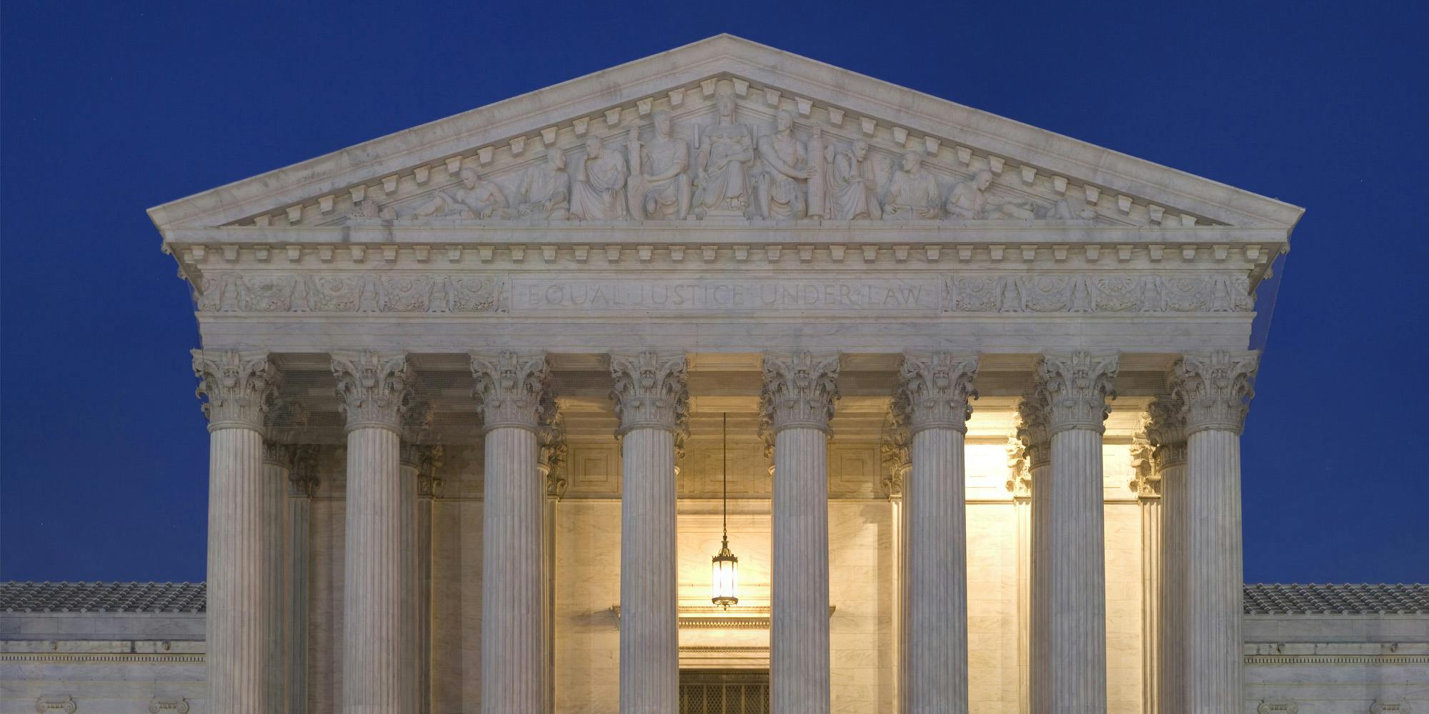 Supreme court with dark blue sky