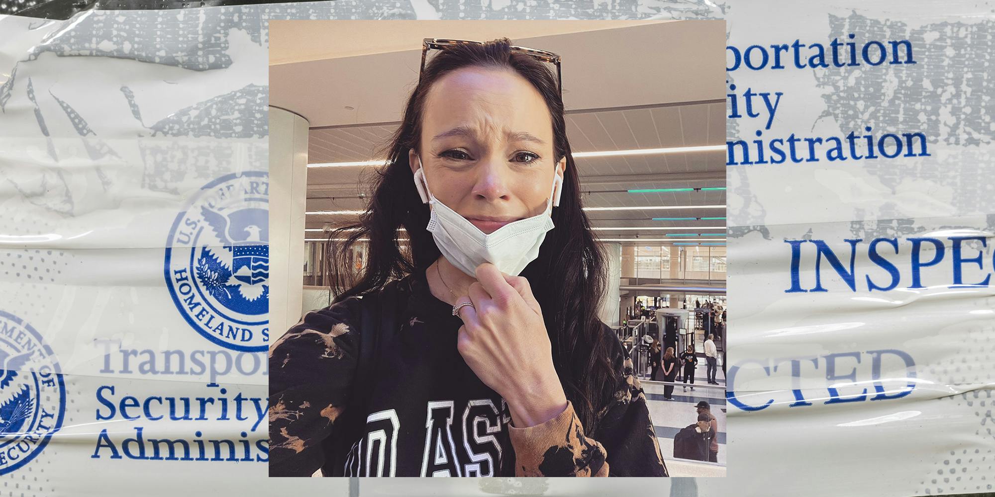 upset woman pulling down mask over TSA "inspected" sticker tape