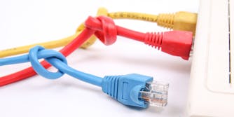 Network cables with knot depicting slow connection