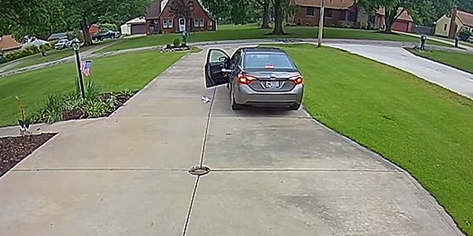 Jimmy John's delivery driver car door open food on driveway