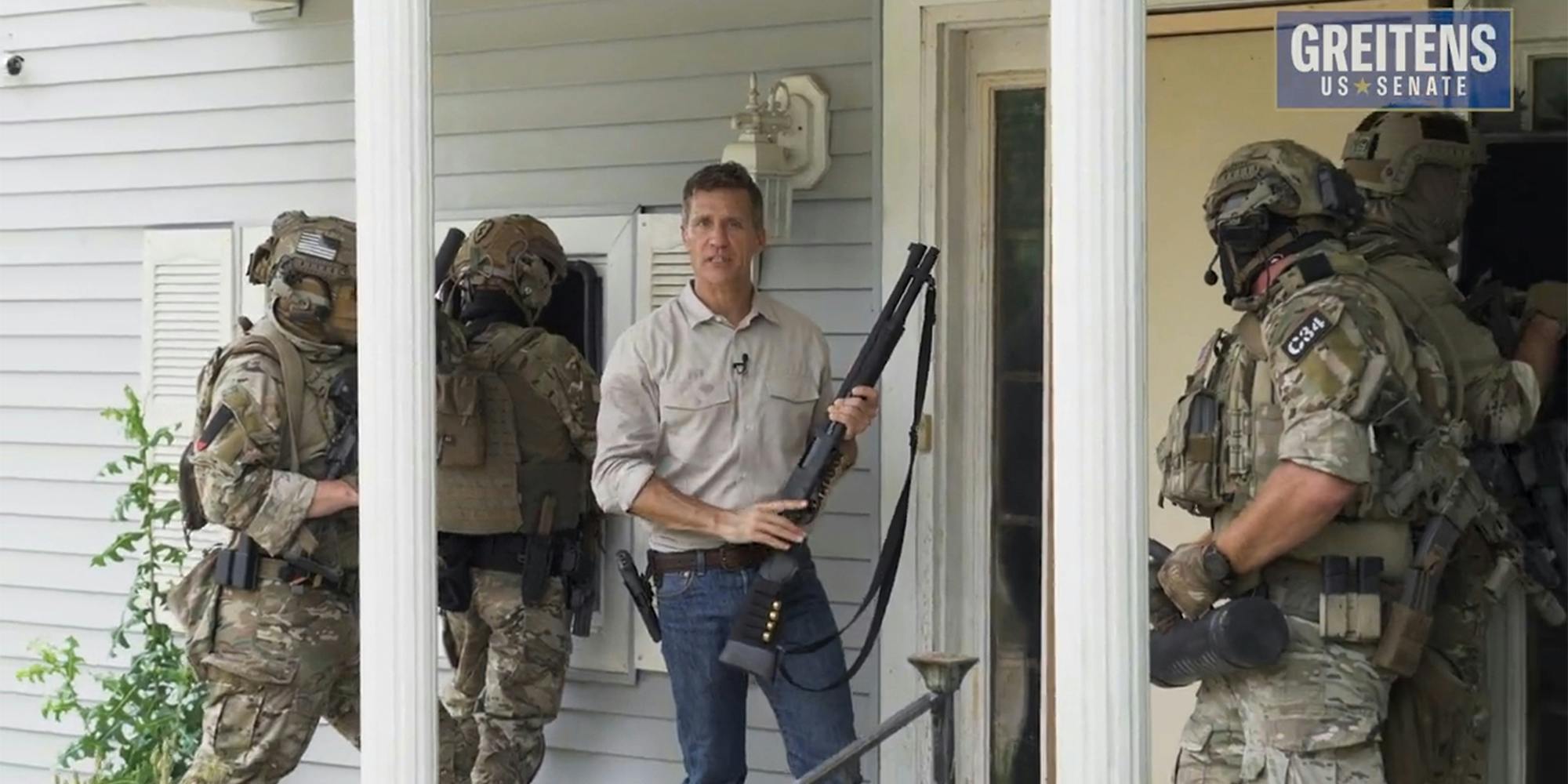 men with weapons on porch preparing to breach door with "Greitens US SENATE" logo