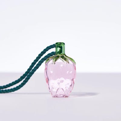Pink glass strawberry one-hitter necklace.