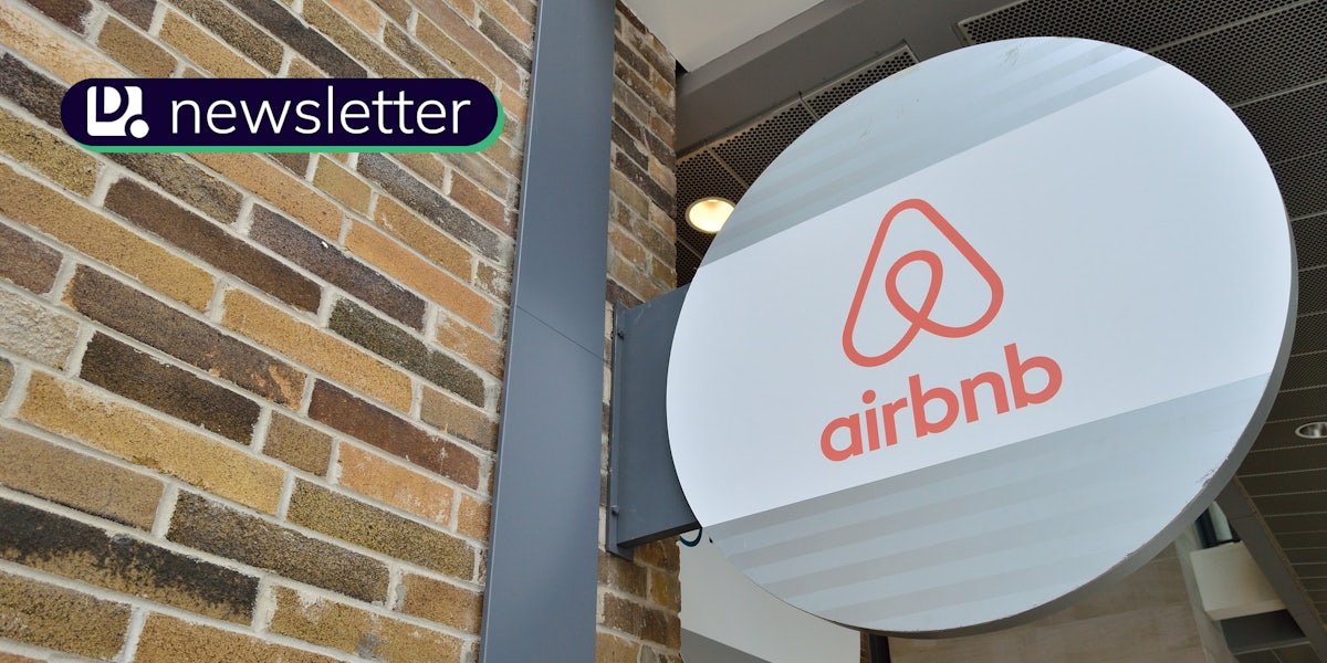 A circular sign with the Airbnb logo. The Daily Dot newsletter logo is in the top left corner.