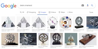 Google Search with "desk ornament" typed in image results in Nazi images