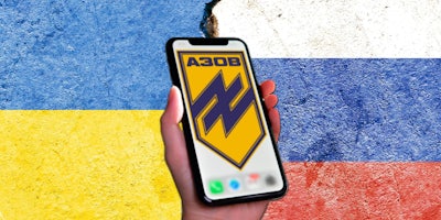Russia and Ukraine design cracked background with hand holding phone with A30B Russian app on screen centered
