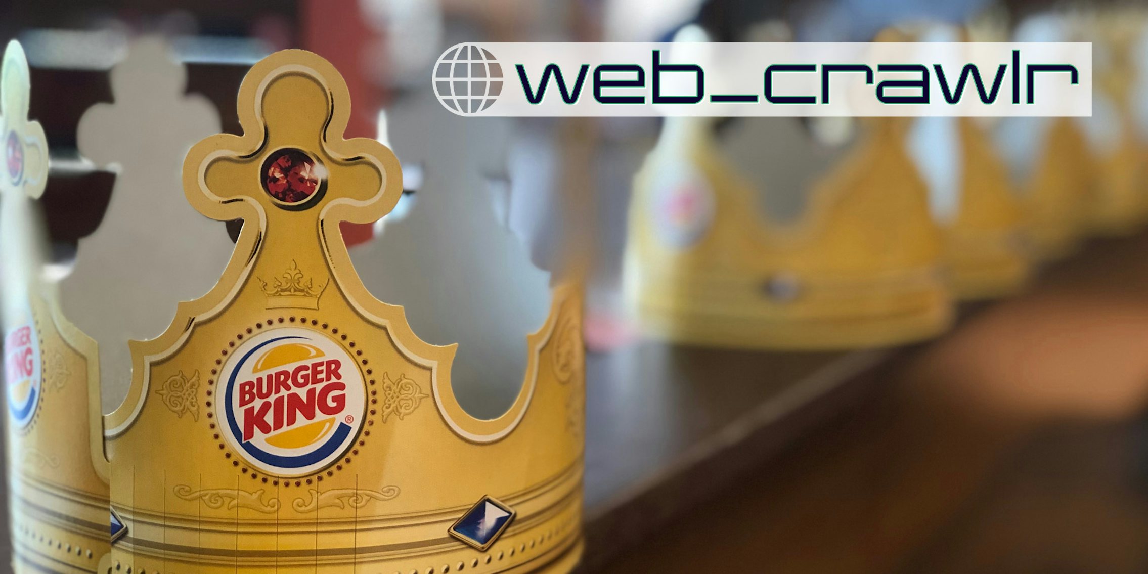 A Burger King Crown. The Daily Dot newsletter web_crawlr logo is in the bottom right corner.