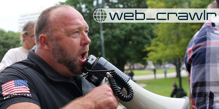 Alex Jones screaming into a bullhorn. The Daily Dot newsletter web_crawlr logo is in the top right corner.