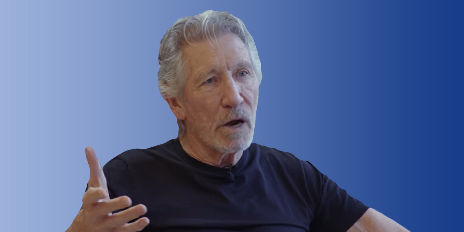 Roger Waters speaking with hand out on light blue gradient background