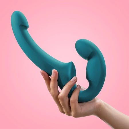 Share Lite double dildo in a person's hand to show its size in scale