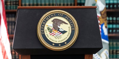 Department Of Justice seal on podium