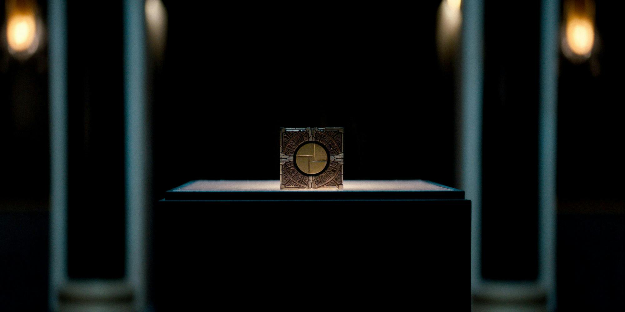 The hellraiser puzzle box, shown displayed on a platform