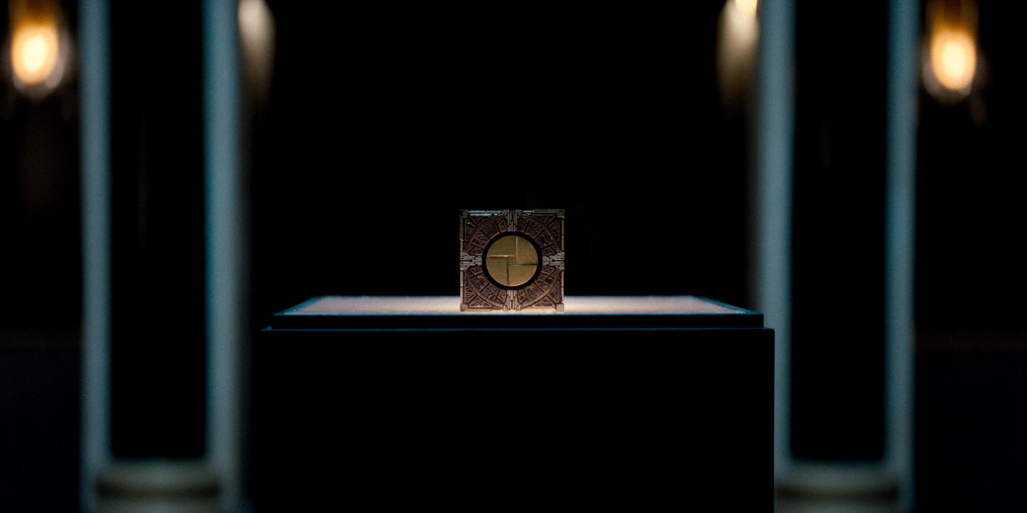 The hellraiser puzzle box, shown displayed on a platform