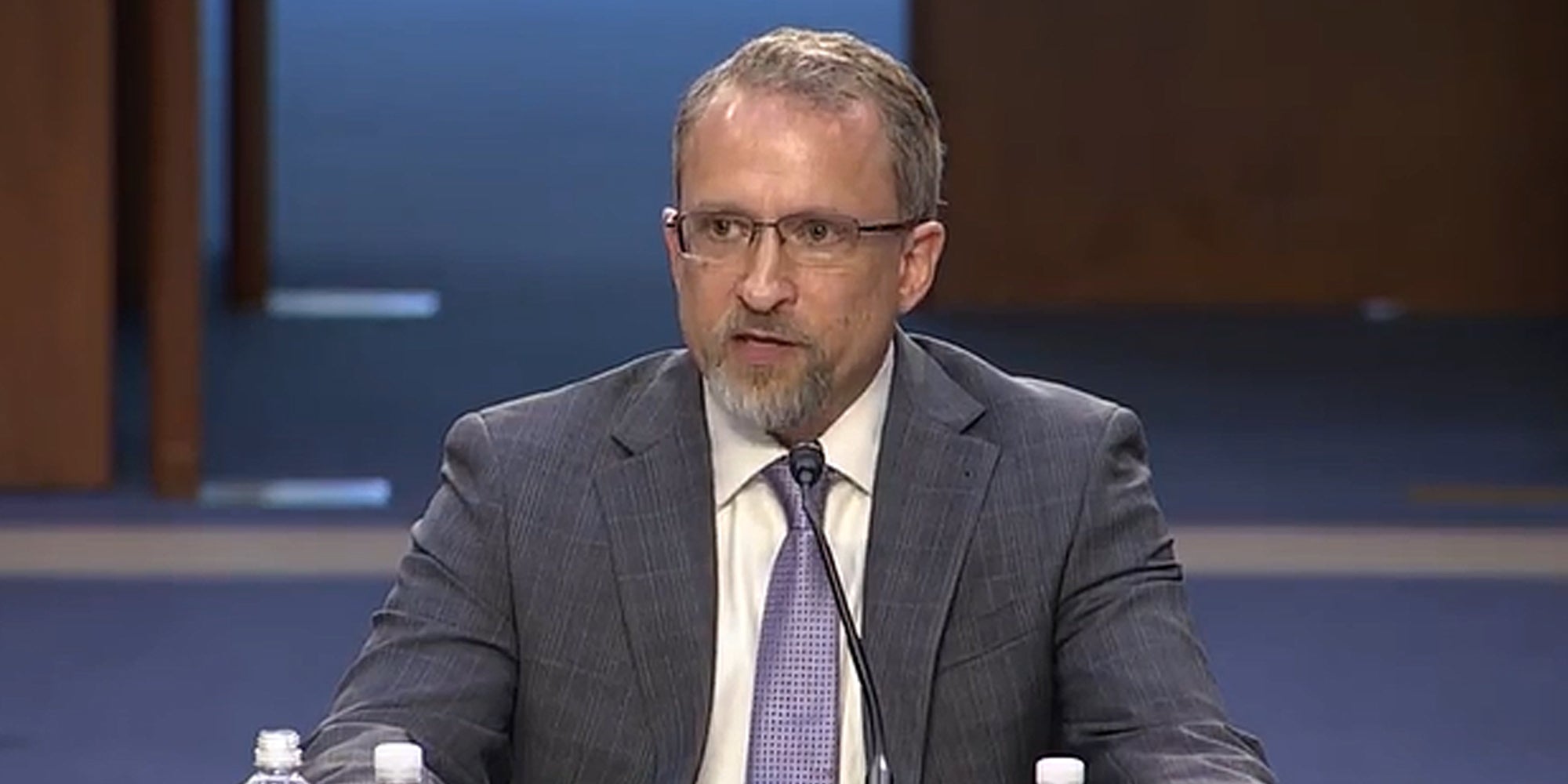 Peiter Zatko speaking into microphone