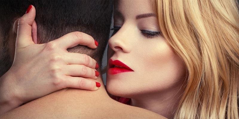 Blonde woman in red lips seducing man closeup