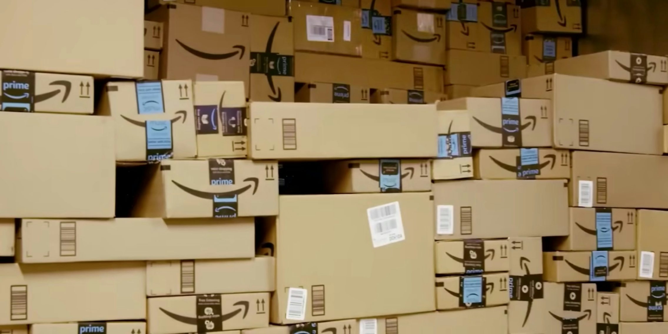 Amazon boxes in the back of a delivery truck