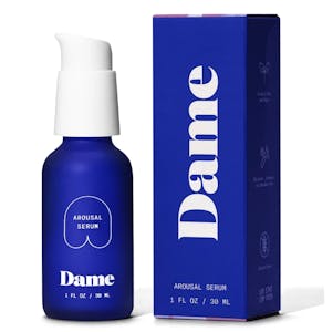 A blue squirt bottle of Dame Arousal Serum beside the blue box it comes in.