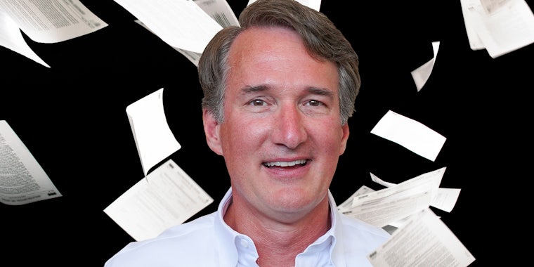 Glenn Youngkin with papers blowing around