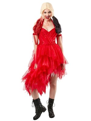 A woman wearing Harley Quinn's red dress from the movie The Suicide Squad.