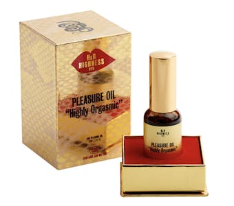 Best CBD lube - A small bottle of Her Highness NYC pleasure oil in a gold box with a red velvet inset beside the gold box in comes in.