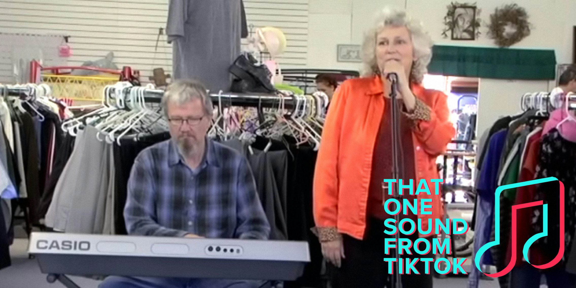 man playing keyboard and woman singing in clothing store with 'That one sound from TikTok' logo