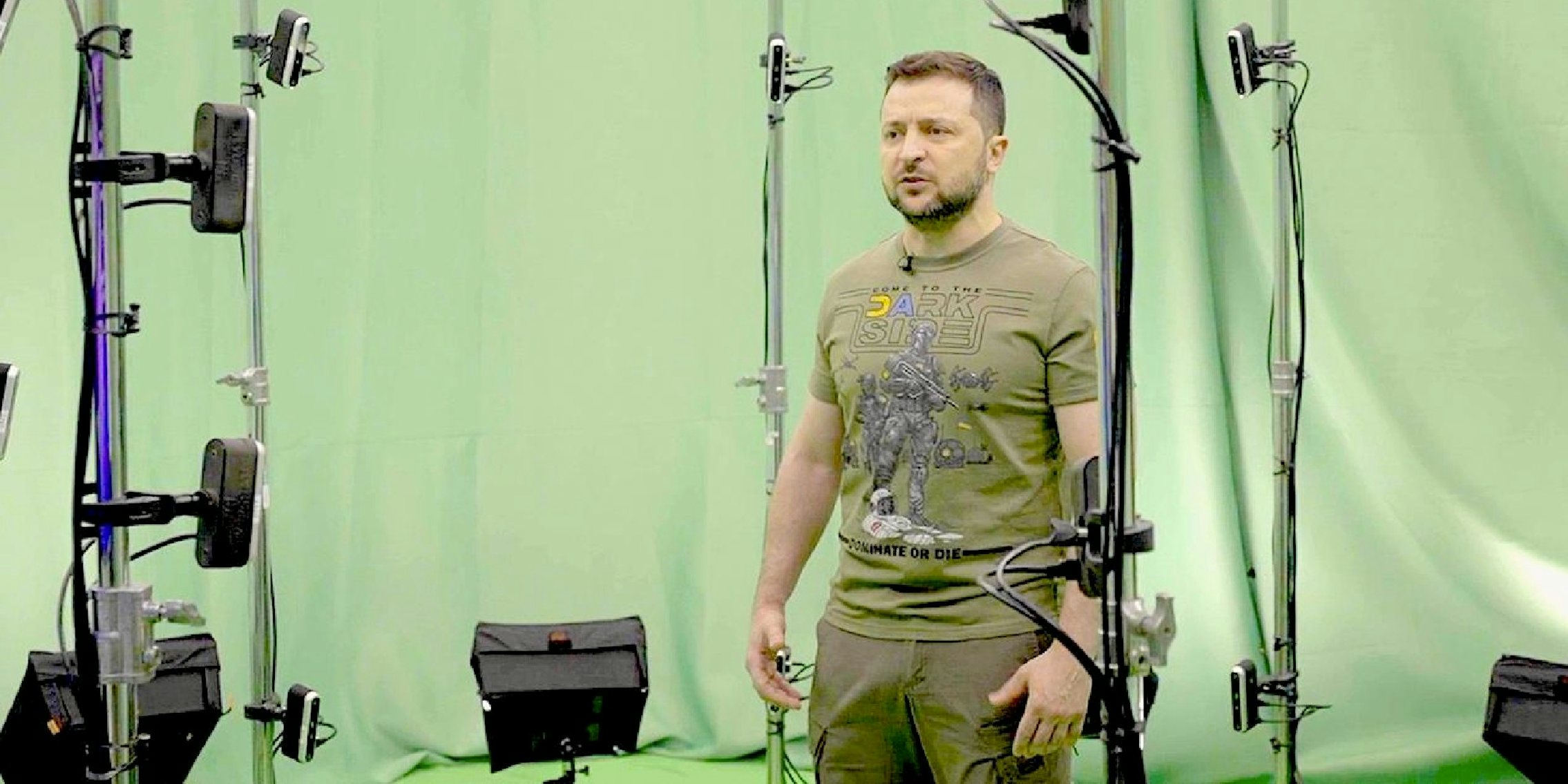 Ukrainian President Volodymyr Zelenskyy standing in front of a green screen