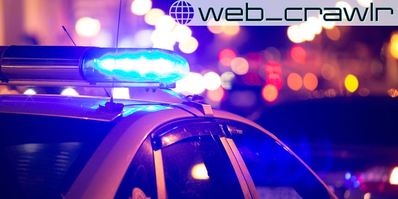 A police car. The Daily Dot newsletter web_crawlr logo is in the top right corner.