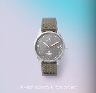 best black friday clothing deals - A charcoal Triwa watch against an aqua and lavender gradient background with the words "shop good & do good" beneath in white letters.