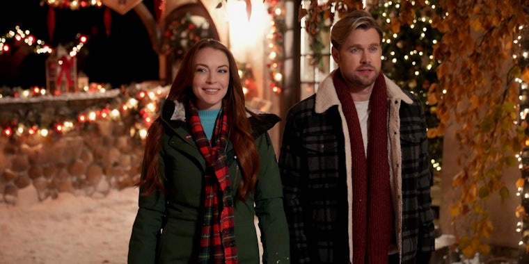 lindsay lohan (left) and chord overstreet (right) in falling for christmas