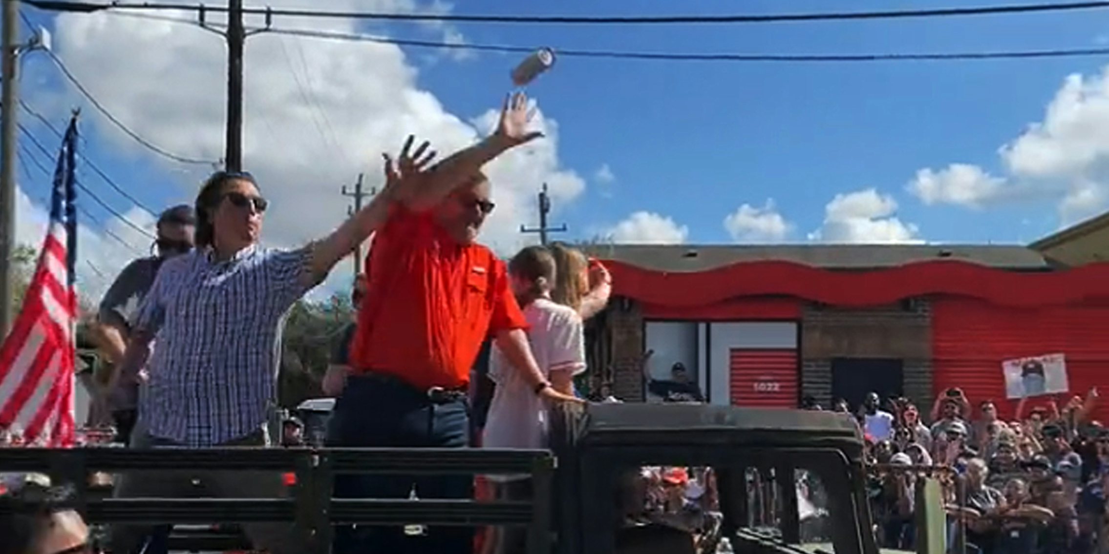 Beer flies at Ted Cruz during Astros World Series Parade