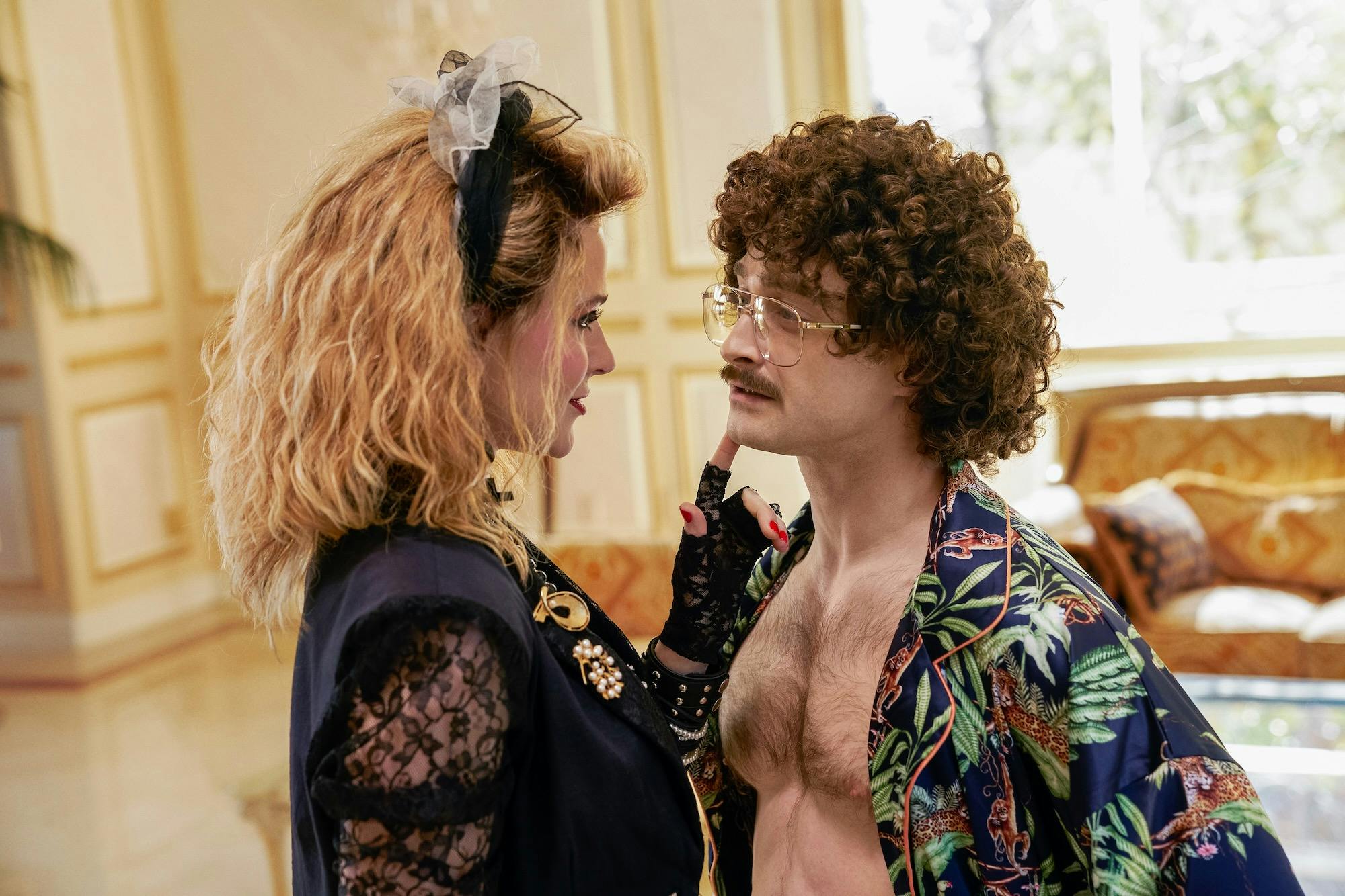 evan rachel wood as madonna (left) and daniel radcliffe as al yankovic (right) in weird the al yankovic story