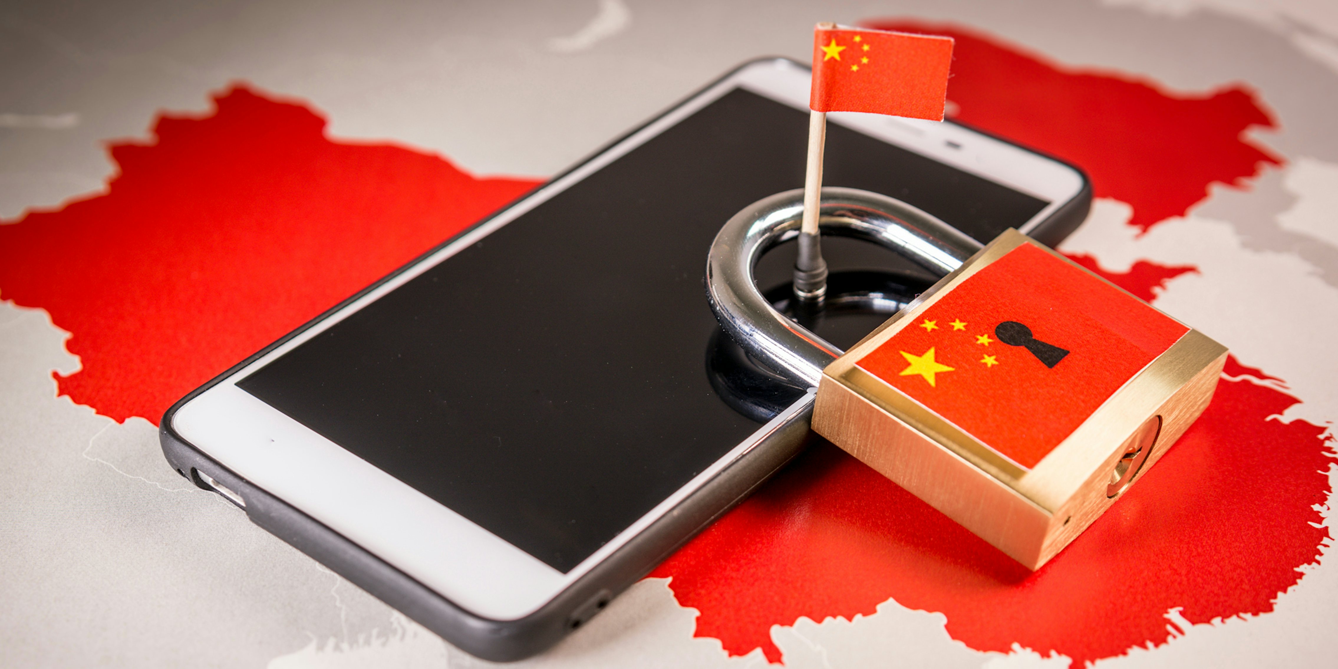 phone on red China outline with lock and flag