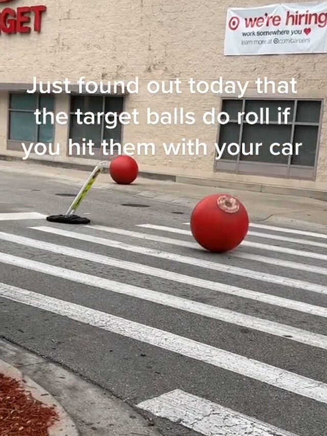 Customer Captures Target Red Ball Rolling Outside