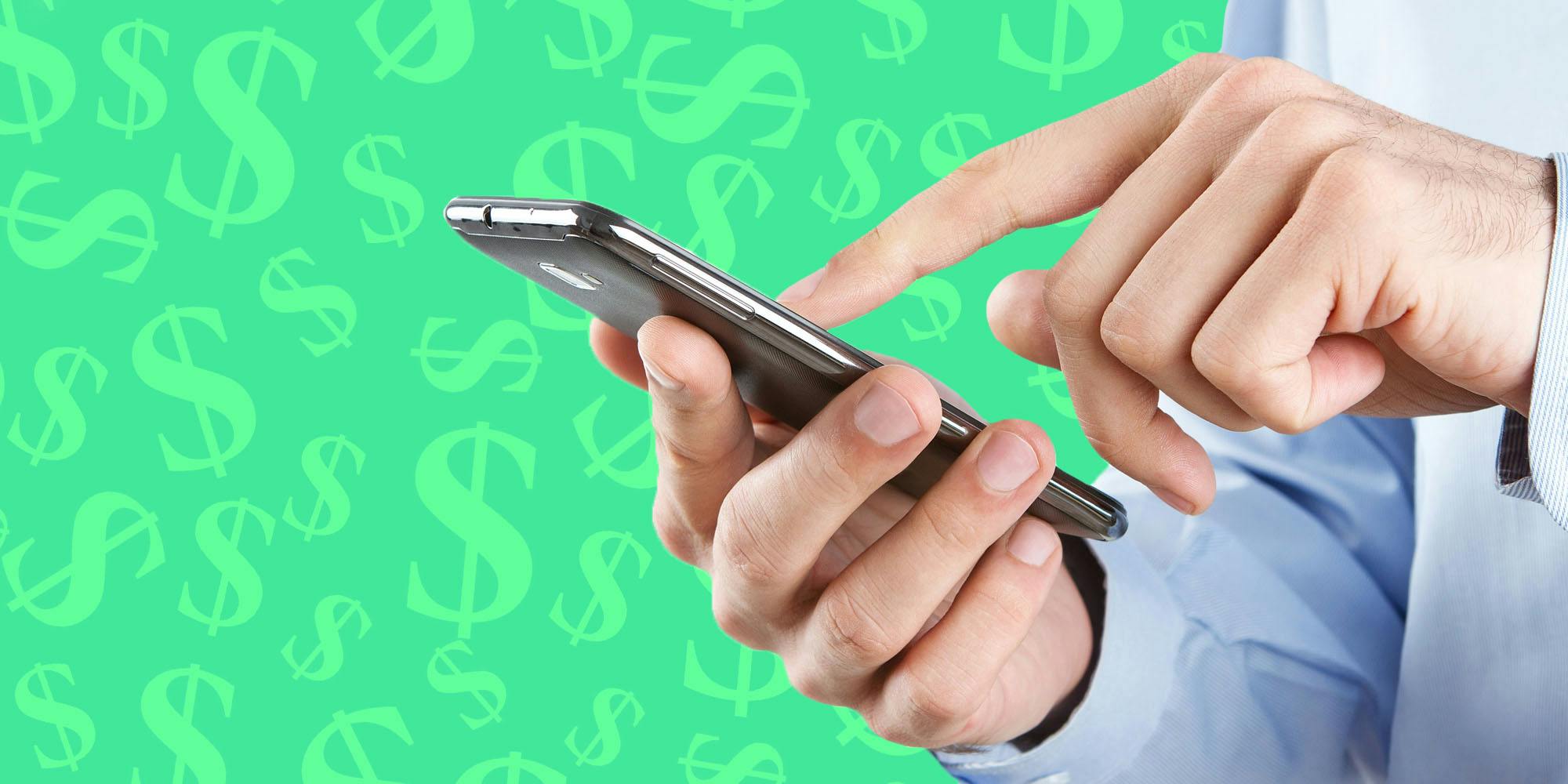 Man holding phone in front of money symbol green background