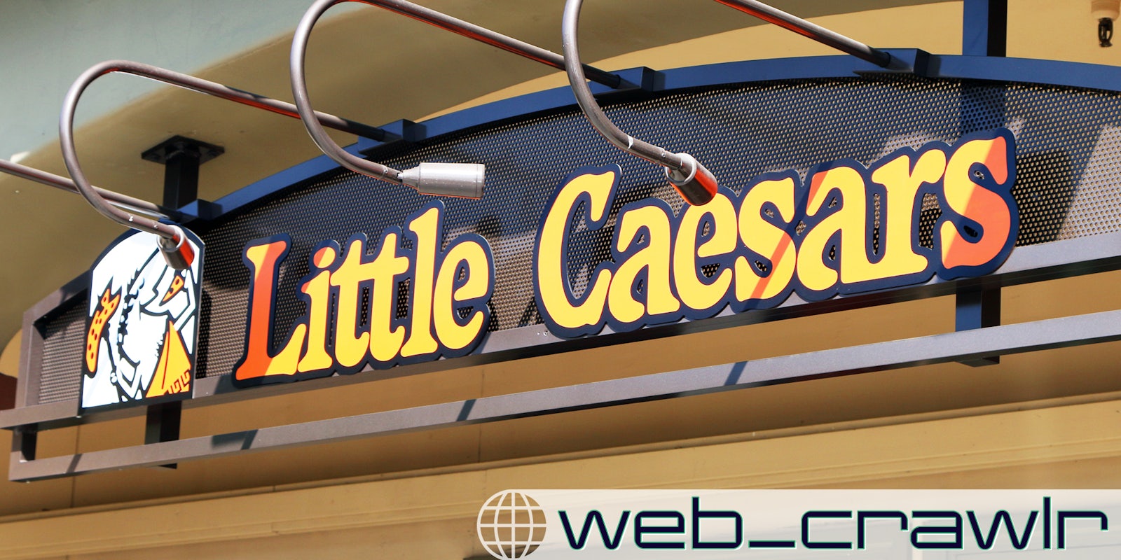 A Little Caesars sign. The Daily Dot newsletter web_crawlr logo is in the bottom right corner.