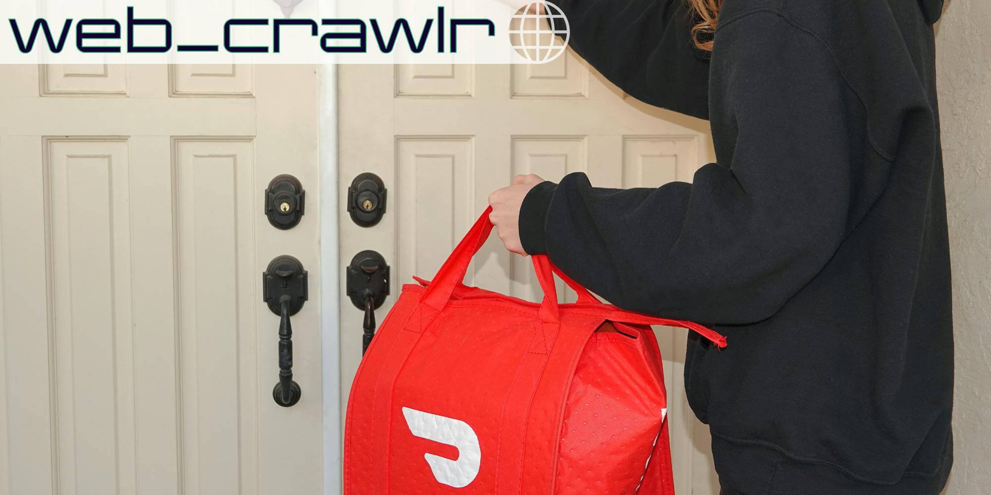 A person holding a bag with the DoorDash logo on it. The Daily Dot newsletter web_crawlr logo is in the top left corner.