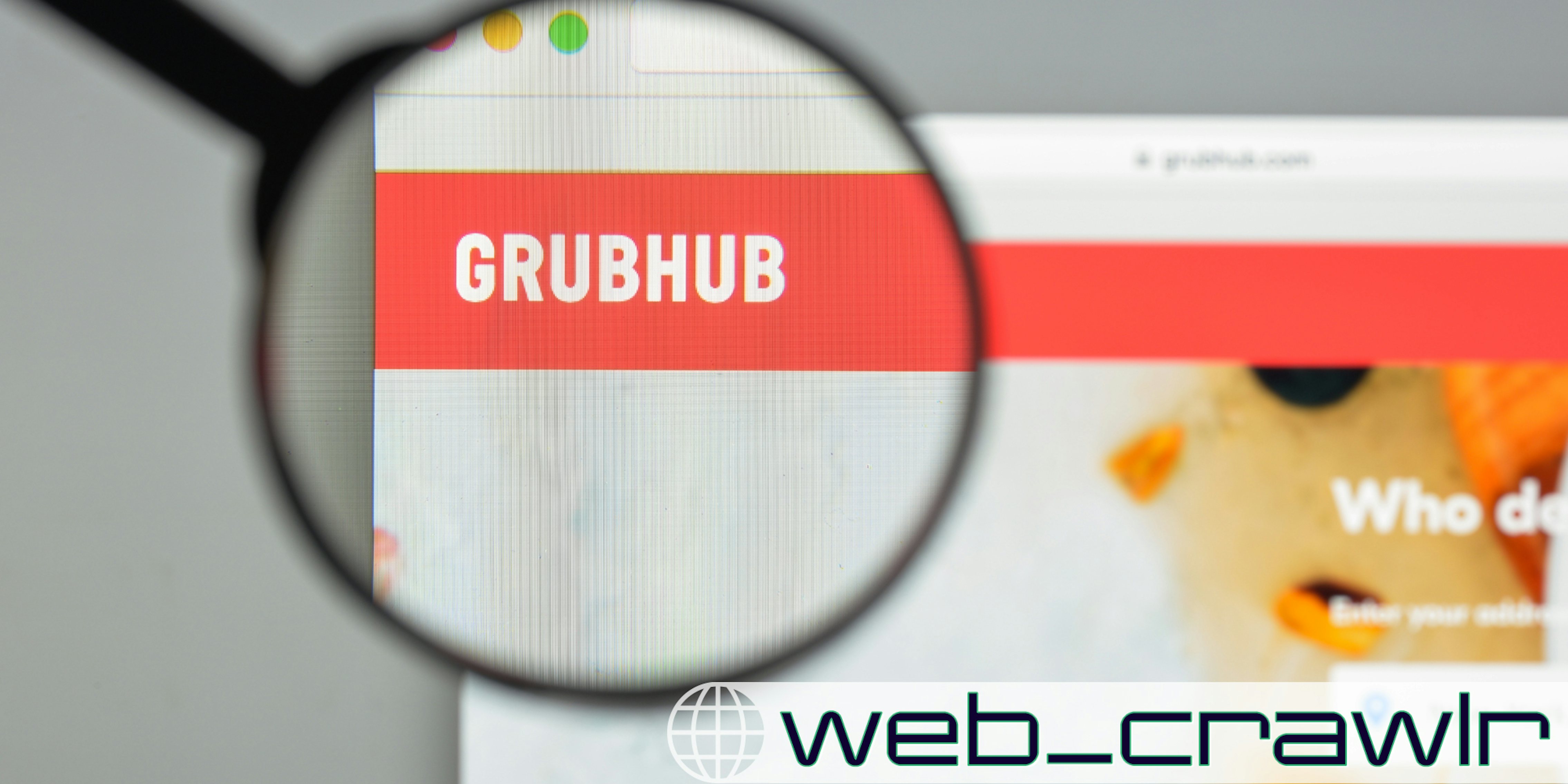 A computer screen with the GrubHub logo on it. A magnifying glass is over the word Grubhub. In the lower right corner is the Daily Dot newsletter web_crawlr logo.