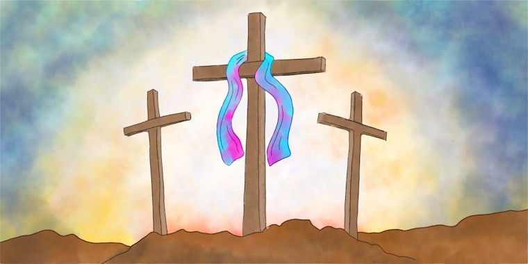 transgender-flag-colored cloth on cross, flanked by two empty crosses