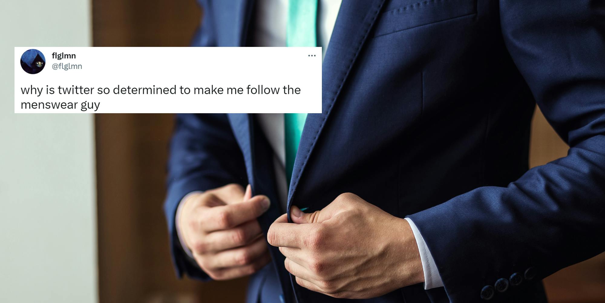 Male fashion model in blue suit with Tweet by @flglmn at left "why is twitter so determined to make me follow the menswear guy"