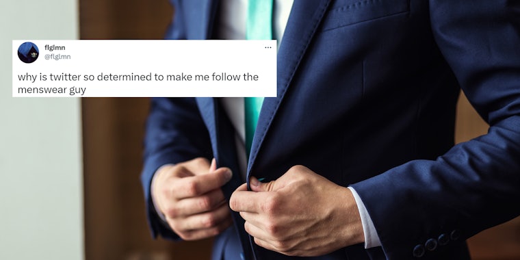 Male fashion model in blue suit with Tweet by @flglmn at left 'why is twitter so determined to make me follow the menswear guy'
