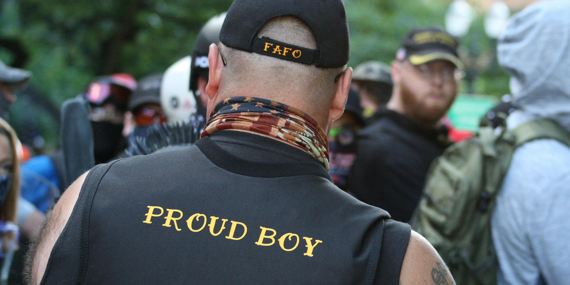 man wearing "proud boy" gear