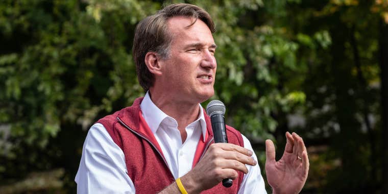 Glenn Youngkin Governor of Virginia speaking into microphone outside