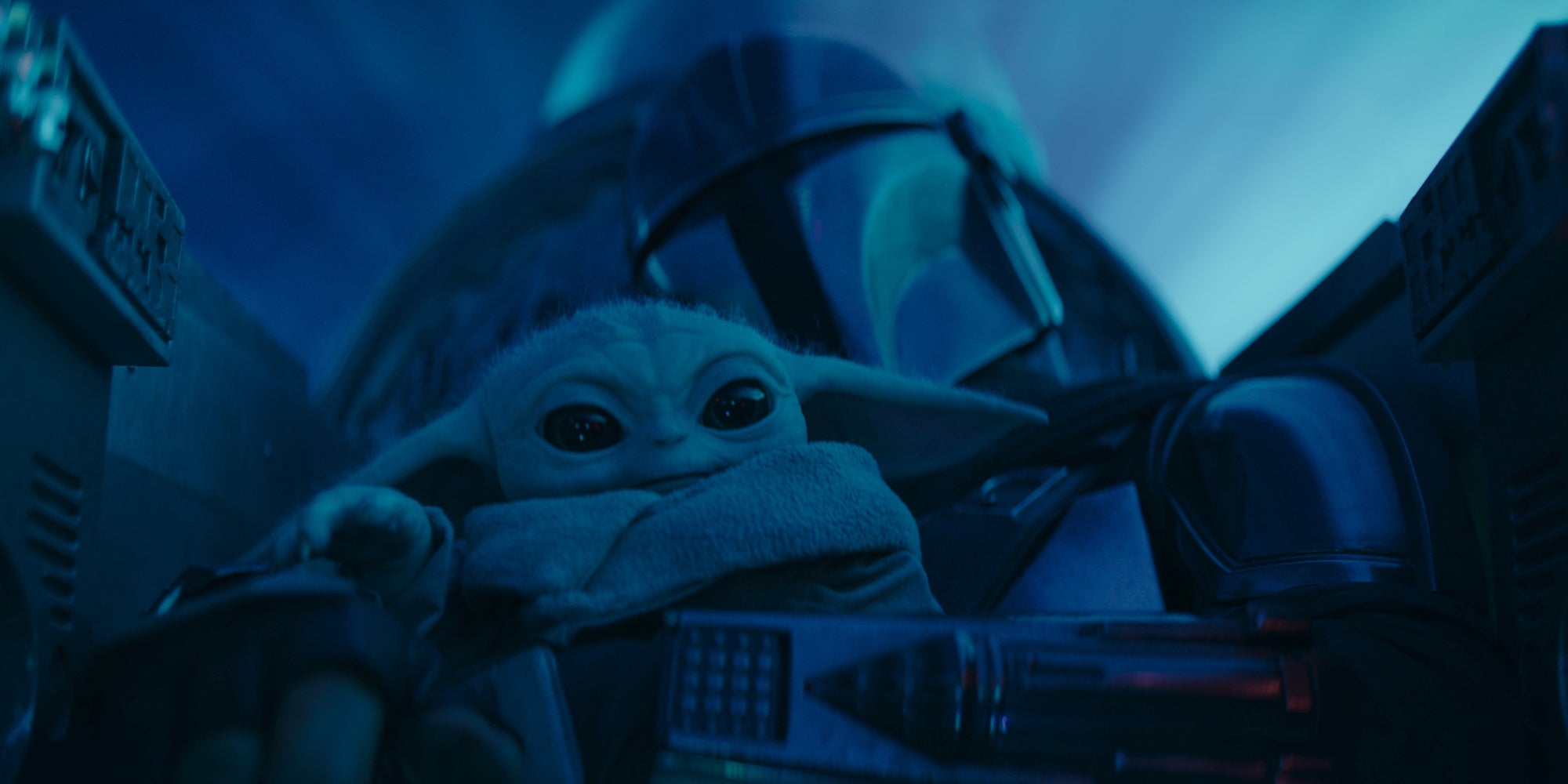 grogu (front) and din djarin (back) in the mandalorian season 3