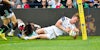 Dave Ewers scores during the Aviva Premiership Ruby game