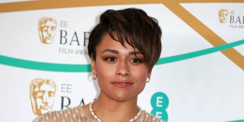 ariana debose at the 2023 bafta awards wearing a white sheer dress and necklace